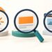 Điểm chất lượng Google Ads: ba kính lúp kiểm tra con trỏ, mẫu quảng cáo và trang đích